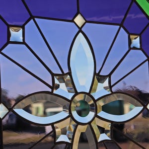 Stained glass panel, window hanging, leaded glass, octagon, purple, green, jewels, bevels.