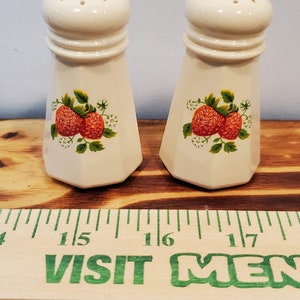 Vintage porcelain strawberry point salt and pepper shakers