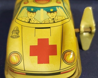 Vintage Lithograph wind up tin toy, ambulance