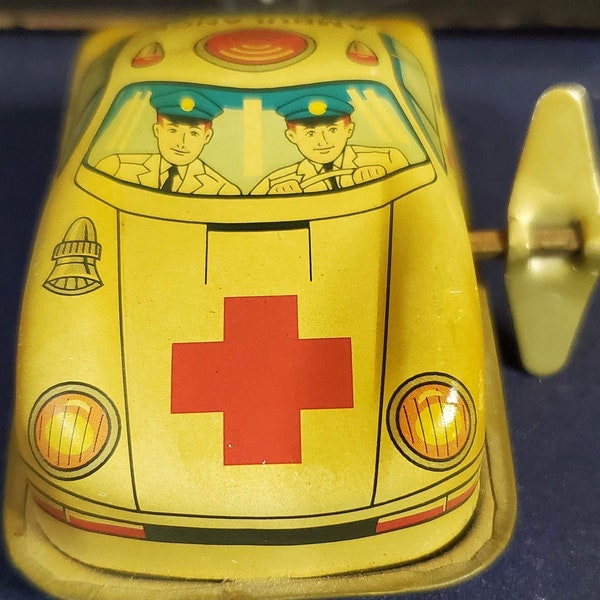 Vintage Lithograph wind up tin toy, ambulance
