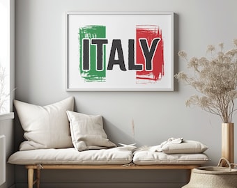 May include: A framed print featuring the word "ITALY" in bold black letters, set against a backdrop of green and red brushstrokes, resembling the Italian flag. The artwork hangs above a wooden bench with cream-colored cushions.
