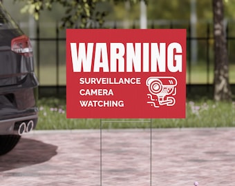 May include: Red and white warning sign with the text "WARNING" in large white letters. Below the text is "SURVEILLANCE CAMERA WATCHING" in smaller white letters. A white silhouette of a security camera is to the right of the text.