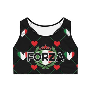 May include: Black sports bra featuring a pattern of red hearts and green lines. The word "FORZA" is centered, with the Italian flag incorporated into the design. The bra has a racerback style.