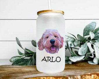 May include: A white frosted tumbler with a bamboo lid and straw. The tumbler features a colourful illustration of a dog with the name "ARLO" printed below.