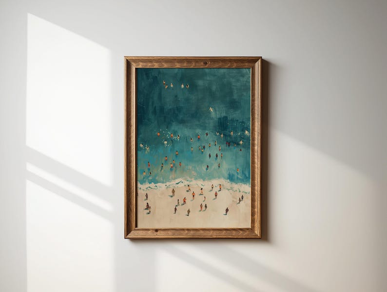 May include: A framed painting of a beach scene with a teal blue ocean and white sand.  Many small figures are scattered across the beach and in the water.