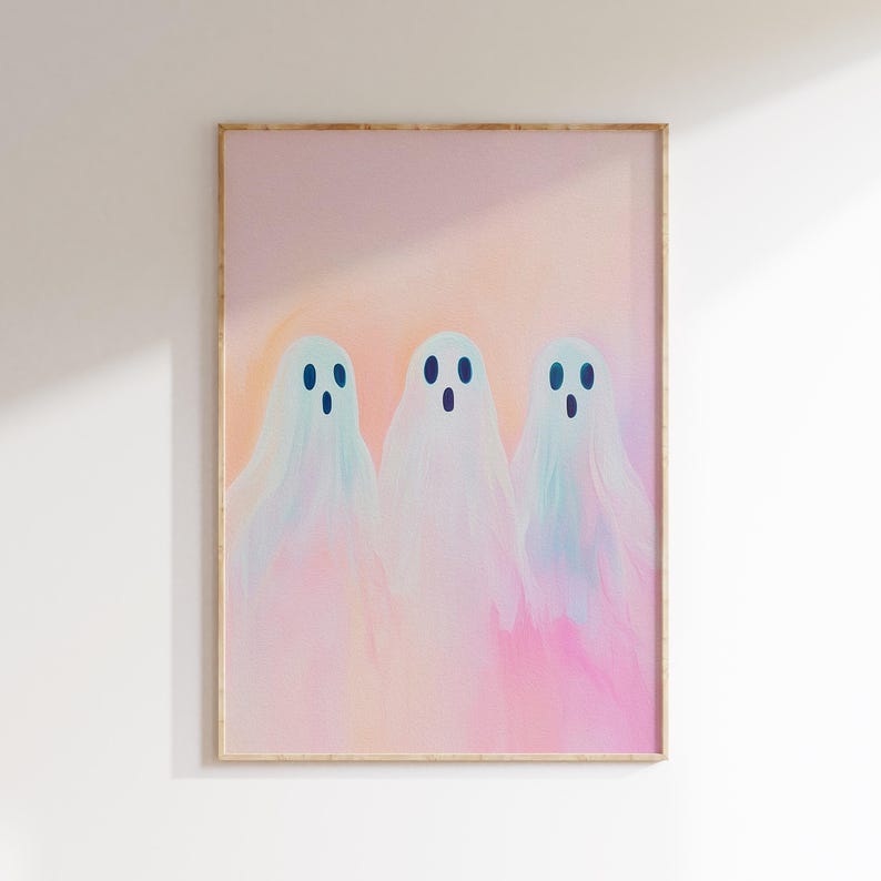 May include: A digital art print featuring three pastel-colored ghosts with blue eyes on a pink background.