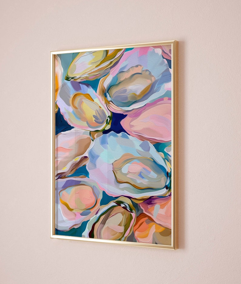 May include: Abstract painting of colorful oyster shells in shades of pink, blue, green, and yellow. The painting is framed in a gold frame.