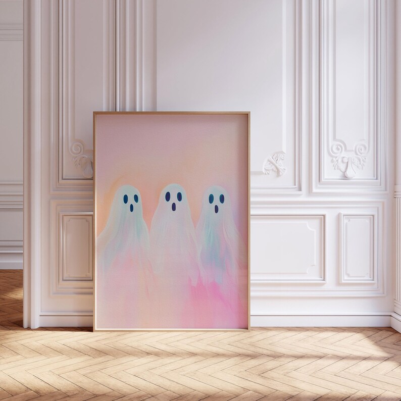 May include: Three white ghosts with blue eyes on a pink and orange background. The ghosts are in a row and are slightly overlapping. The background is a gradient of pink and orange.