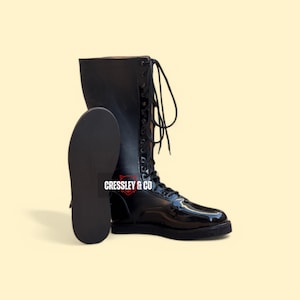 Zwarte worstellaarzen heren, glanzend leer Pro Gear, platte zoolringlaarzen voor optreden of cosplay