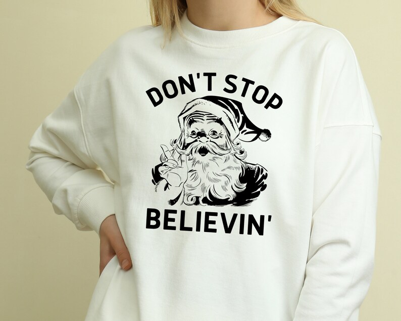 DON'T STOP BELIEVING Graphic Drop Shoulder Sweatshirt