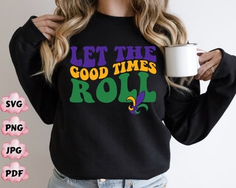 May include: Black sweatshirt with the text "Let the good times roll" in green, yellow, and purple letters. A purple and gold fleur-de-lis is below the text.
