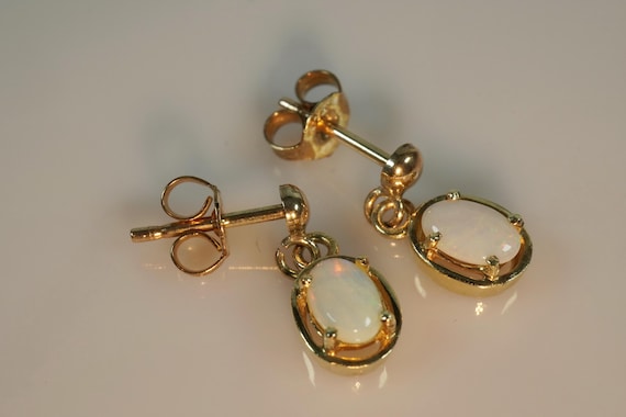 Stunning 9ct gold Opal Earrings - image 1