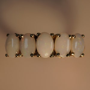 Magnificent natural opal ring set in 9ct Gold