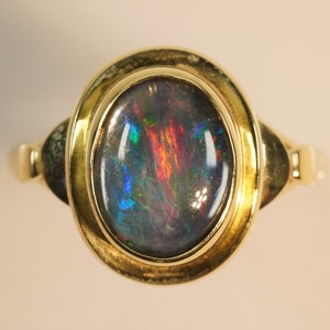 Mystical vintage 9ct gold opal ring