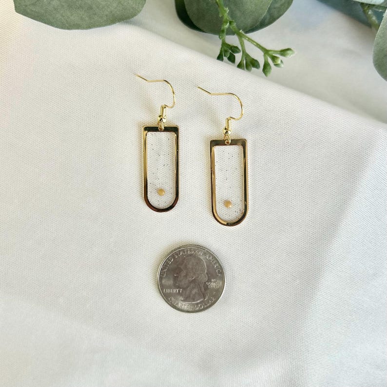 Biblical Inspiration Jewelry Mustard Seed Earrings Faith Symbol Design Gold Frame Window Shape Handcrafted Resin Creation Spiritual Gift Idea Christian Jewelry Collection Hope Reminder Daily Wear Religious Expression Valentine Day Present
