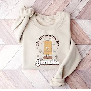 È la stagione del maglione Tamales - Divertente maglione natalizio Tamale - Graziosa maglietta natalizia per neonati - Regalo segreto di Babbo Natale - Felpa con cappuccio natalizia