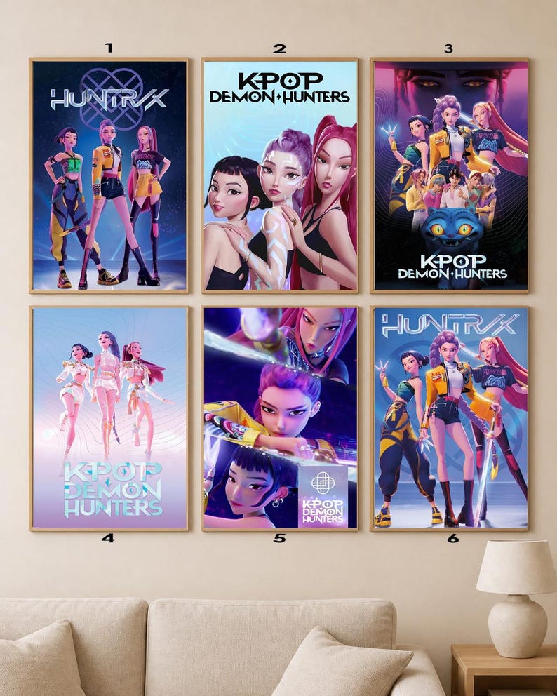 May include: A collection of six framed posters featuring stylized illustrations of K-Pop group members. The posters display the text "HUNTRX" and "KPOP DEMON HUNTERS" in various designs, with vibrant colors and dynamic poses.