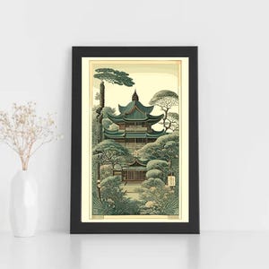 May include: A framed print of a traditional Japanese pagoda surrounded by lush green trees and foliage. The pagoda is painted in shades of green and brown, with a golden roof. The print is set against a cream-colored background.