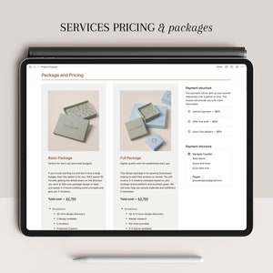 May include: A tablet screen displaying a website with pricing information for two different design packages: Basic and Full. The website features a mockup of a box with the word "Mockup" printed on it. The text on the screen includes the total cost for each package, a breakdown of the services included, and payment structure details.