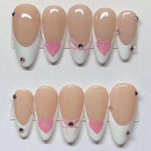 pink valentines nails| French tip nails| valentines| press ons for Valentine’s Day| pink coquette nails| bow nail art| glitter nails