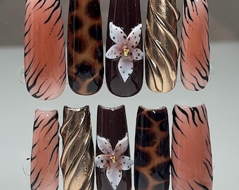 Gold and brown set with 3d flowers, tiger stripes, and tortoise shell press ons
