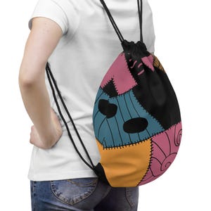 Könnte beinhalten: Ein Set aus drei Keramikbechern mit gesprenkelter, matter Oberfläche. Die Becher sind in Creme-, Hellgrau- und Dunkelgrautönen gehalten. Jeder Becher hat ein schlichtes, minimalistisches Design.