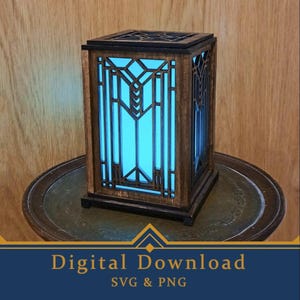 Puede incluir: Una linterna de madera con un diseño geométrico, con un interior azul que se ilumina a través de los patrones recortados. La linterna es rectangular y se encuentra sobre una superficie redonda de color oscuro. El texto "Digital Download" es visible en la parte inferior.