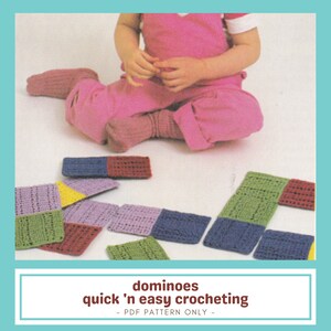 May include: A selection of colourful, crocheted dominoes in various colours, including green, blue, purple, and red, are scattered on a white surface. The image includes the text "dominoes quick 'n easy crocheting - PDF PATTERN ONLY -."