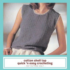 May include: A gray cotton shell top with white trim around the neckline and armholes. The top is sleeveless and has a textured crochet pattern. The image includes the text "cotton shell top quick 'n easy crocheting - PDF PATTERN ONLY -."
