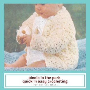 May include: A baby wearing a cream-colored, open-weave crochet cardigan. The baby is holding a daisy. The image has a teal border and text that reads "picnic in the park quick 'n easy crocheting - PDF PATTERN ONLY -."