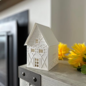 Dekoracja wielkanocna Luminary Paper House Village na centralny element wielkanocnego stołu brunchowego SVG Cut File Cricut Dekoracja wielkanocna Wiosna DIY Wysoki dom
