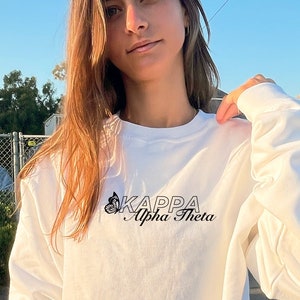 Kappa Alpha Theta Butterfly Script Cute Simple Trendy Theta Sorority Crewneck Sweatshirt - Black / White Color way Options