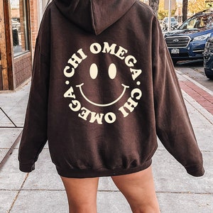 Chi Omega Smile Sorority Sweatshirt | Trendy Chi O Custom Sorority Hoodie | Available in Brown Black Green Blue & Pink
