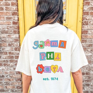 Gamma Phi Beta Fun Doodle Scrapbook T-Shirt | Gamma Phi Trendy College Greek Custom Oversized Shirt | GPhi Big Little Sorority T Shirt