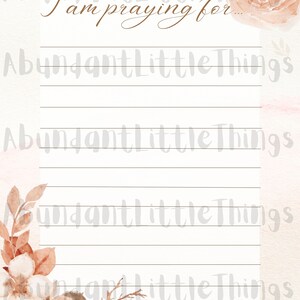 May include: A printable prayer journal page with a watercolor floral design in shades of brown and pink. The text "I am praying for..." is written in brown cursive script at the top of the page. The page has lined spaces for writing prayers.