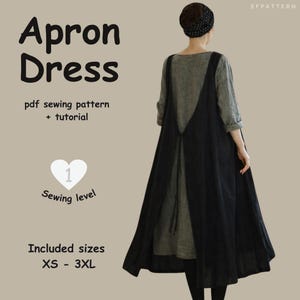 May include: A black apron dress with a wide, flowing skirt, worn over a gray long-sleeved top. The image includes text that reads "Apron Dress," "pdf sewing pattern + tutorial," "Sewing level 1," and "Included sizes XS - 3XL."