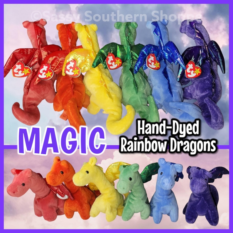 May include: A collection of twelve plush dragon toys in a rainbow spectrum of colours, including red, orange, yellow, green, blue, and purple. Each dragon features shiny wings and a small red heart-shaped tag. Text reads MAGIC Hand-Dyed Rainbow Dragons.