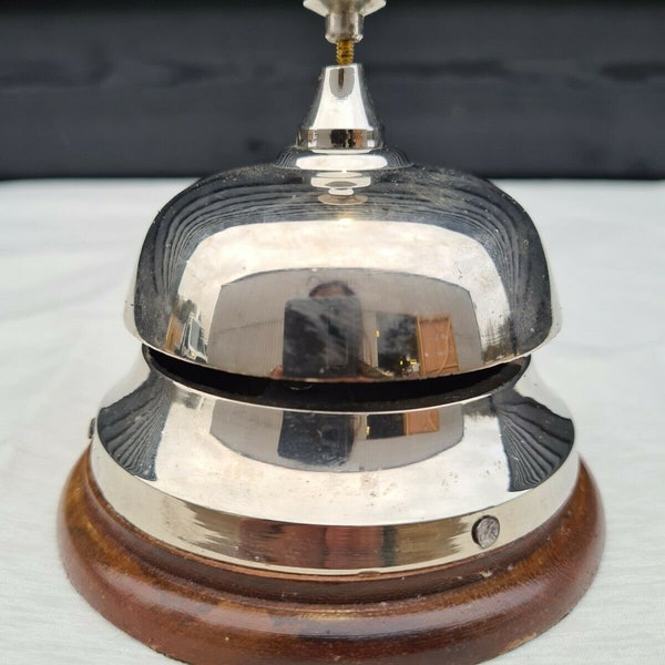 Nickel plated desk bell on wood base