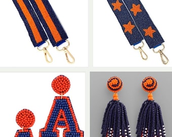 May include: Two pairs of beaded earrings. One pair features a blue and orange letter "A" and the other pair features a blue and orange tassel. Two beaded straps, one with orange stripes and the other with orange stars.