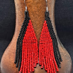 Bold and Beautiful: Red and Black Long Fringe Beaded Earrings. Handmade Red and black fringe beaded earrings.