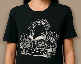 How to Conjure my Human - Black unisex Tshirt made of 100% organic cotton - Black witch cat with magic book