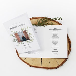 May include: A white and grey funeral order of service with a floral border and a photograph of a woman. The order of service includes the name "Jennifer Palmer", the date "18.09.81 - 16.10.22", and the location "Unison Church Memorial Centre, Ceres, Wednesday 23rd November 2022, at 11:00am". The order of service also includes a list of readings, music, and other details for the funeral service.