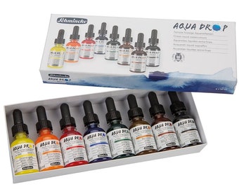 May include: A set of 10 Schmincke Aqua Drop watercolors in a white box. The bottles are clear with black caps and droppers. The colors are: Lemon Yellow, Orange, Red, Scarlet, Violet, Turquoise, Blue, Indigo, Sepia, and Brown.