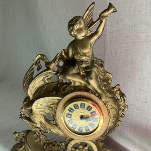Vintage Cast Iron Gold Metal Cherub Mantle Clock