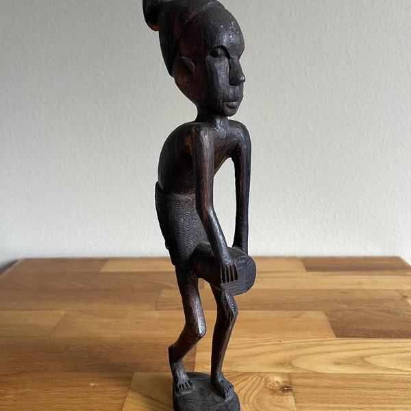 Vintage hand carved African statue.