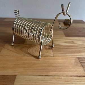 Portapapeles de sobremesa con forma de animal en espiral, auténtico, vintage
