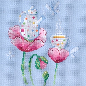 May include: A cross-stitch embroidery design featuring a teapot and a teacup on a blue background with pink poppy flowers. The teapot and teacup are decorated with colorful polka dots.