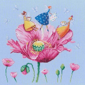 May include: Three fairies are sitting on a pink poppy flower, each holding a teacup. The fairies are wearing colorful dresses and have wings. The poppy flower has a green center and is surrounded by blue butterflies.