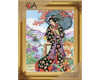 May include: A woman in a black and purple kimono with a floral pattern holds a blue and white umbrella. She is standing in a garden with pink and white flowers. The image is framed in gold.
