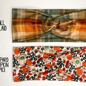 May include: Two headbands are displayed. The top one features a plaid pattern in shades of brown, orange, and green. The bottom headband has a white background with a pattern of pumpkins, coffee cups, and leopard print. Text on the left reads "Fall Plaid" and "Leopard Pumpkin Spice."